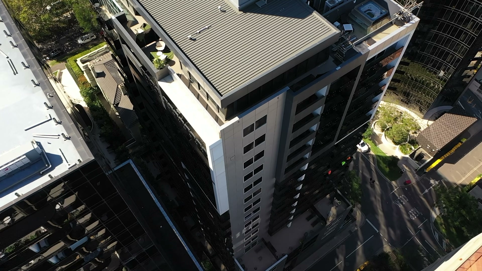 Pro-Build Plus technician fixing a compliant façade panel on a live building