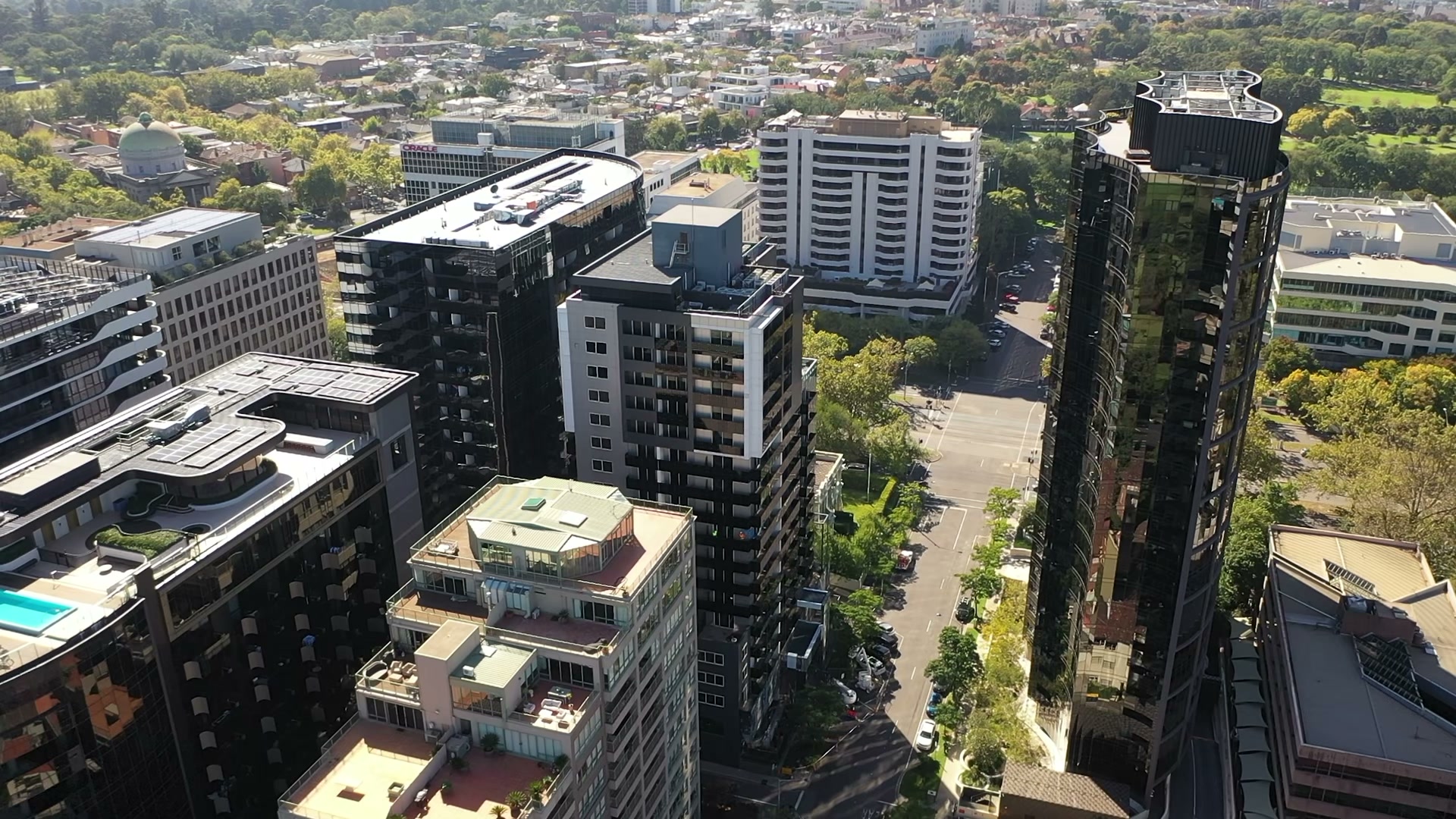 Aerial view of two completed towers with compliant non-combustible façades