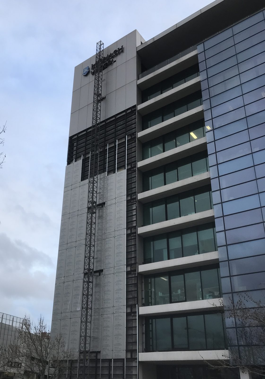 Monash University Caulfield — façade recladding across multiple elevations of an operational campus